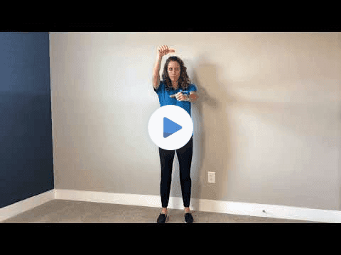 Video: Kristen demonstrating Gaze Shifts with Thumbs while standing, arms extended with thumbs up