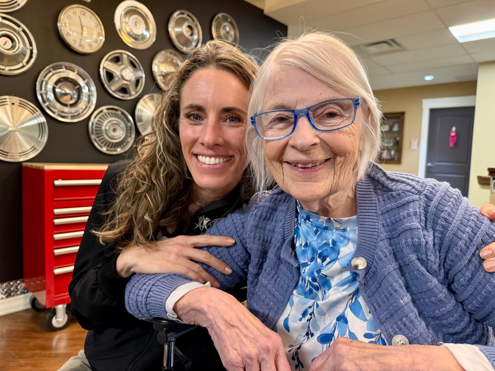 TogetherWON founder Kristen Nielsen smiling with her client Phyllis